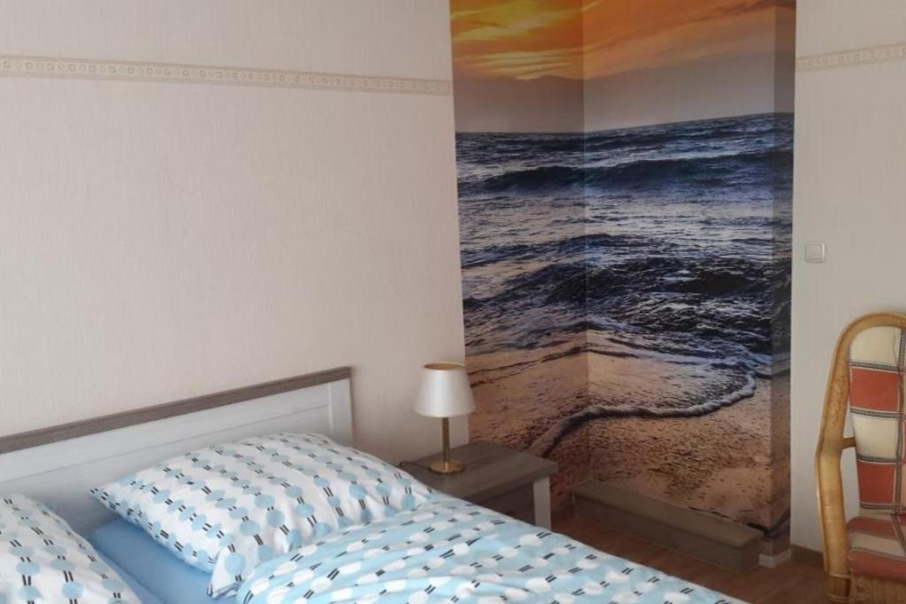 Ένα ή περισσότερα κρεβάτια σε δωμάτιο στο NEU! Ferienwohnung Tide