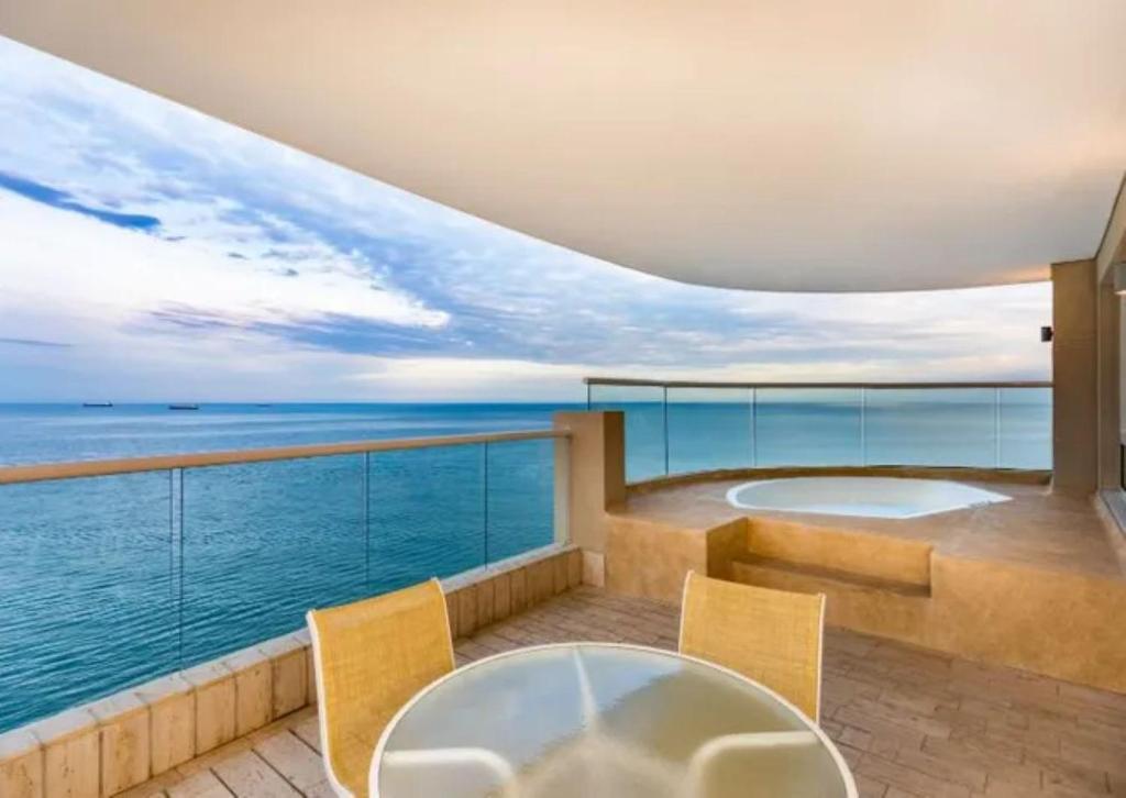 a balcony with a view of the ocean at Hotel Irotama Reservado in Santa Marta