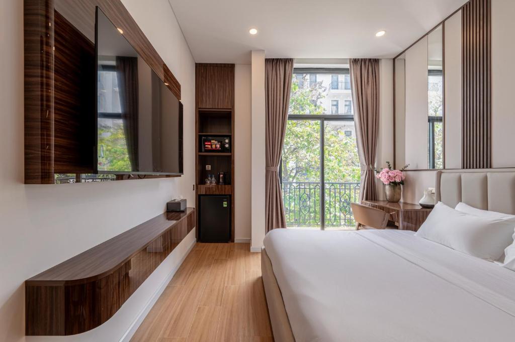 Ένα ή περισσότερα κρεβάτια σε δωμάτιο στο AviCasa