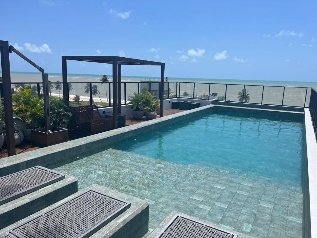 Бассейн в Flat Mar Doce Lar na praia do Bessa или поблизости