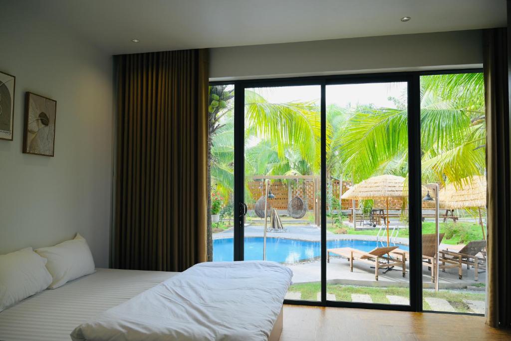 Bazén v ubytování Biển Tôm Ốc villa riêng biệt - Hồ Bơi & Gốc Chill Sân Vườn nebo v jeho okolí