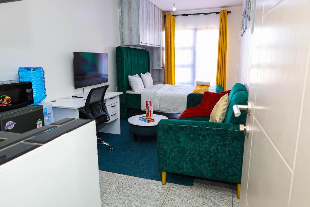 TV a/nebo společenská místnost v ubytování Acehomes Studio