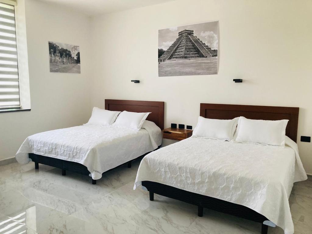 Postel nebo postele na pokoji v ubytování Hotel Casa Vivaldi