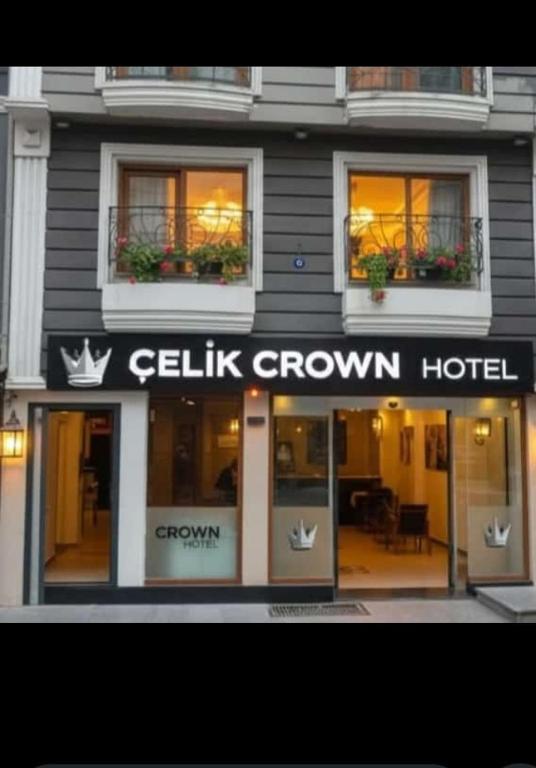 a building with a sign for a gilitz crown hotel at Çelik Crown Hotel in Trabzon