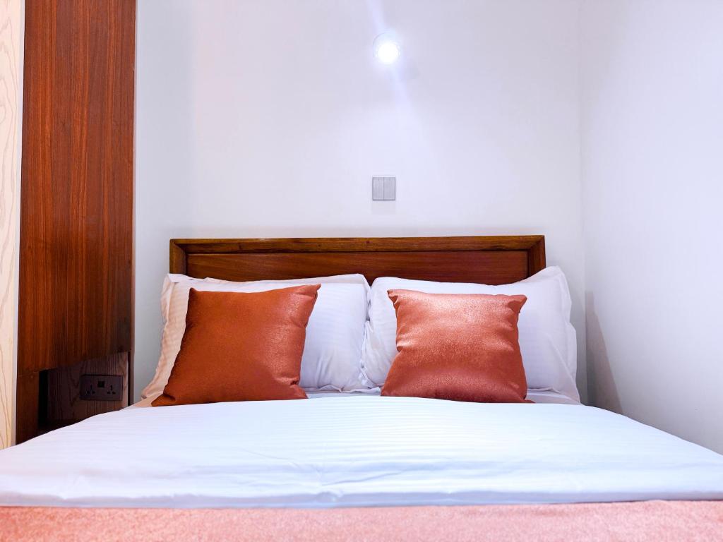 Un ou plusieurs lits dans un hébergement de l'établissement Five-Eight Residences