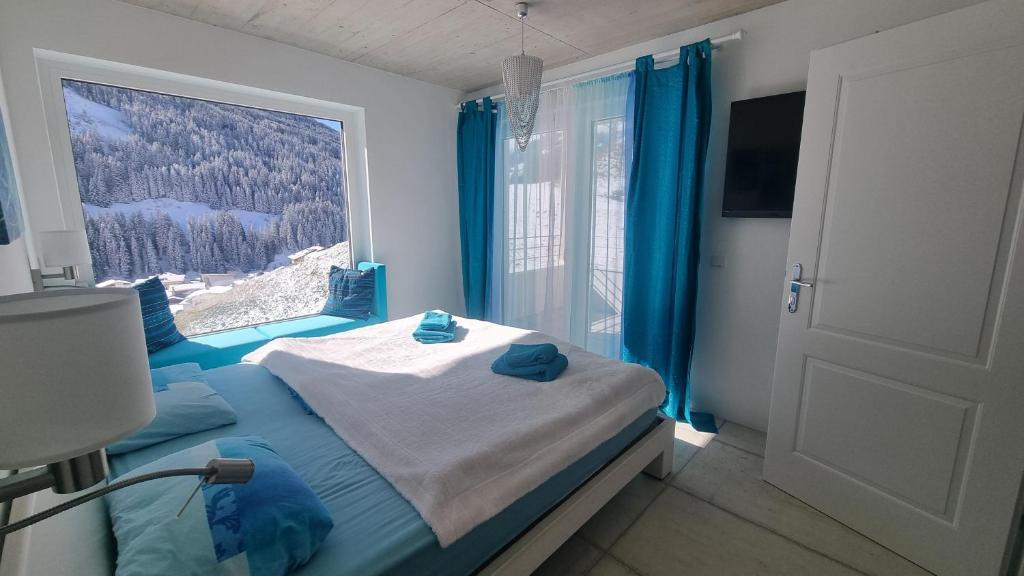 Ένα ή περισσότερα κρεβάτια σε δωμάτιο στο Blue Mountain Suite