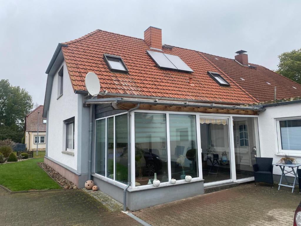 a house with sliding glass doors on it at Haus Sommerfeld 