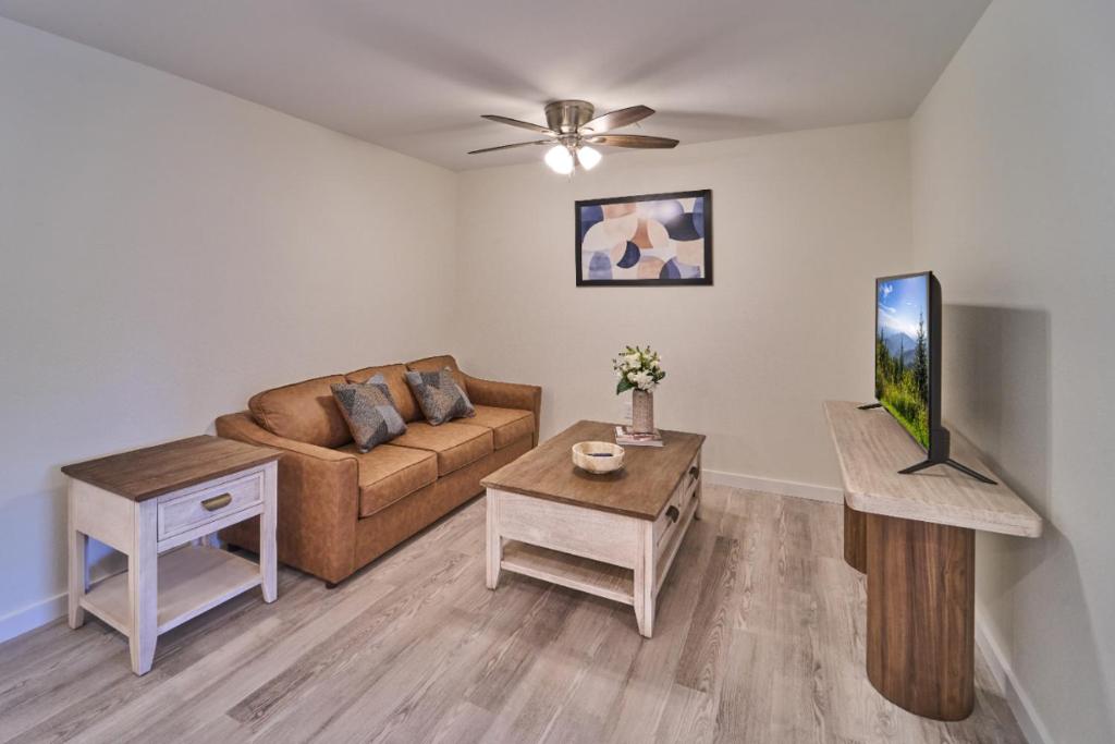 a living room with a couch and a table at The Ruby 301 By Avada Properties in Pigeon Forge