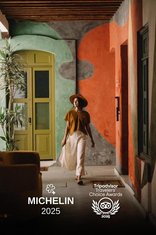 Hotel Pug Seal Oaxaca, a poster for the movie michelin at Pug Seal Oaxaca in Oaxaca City