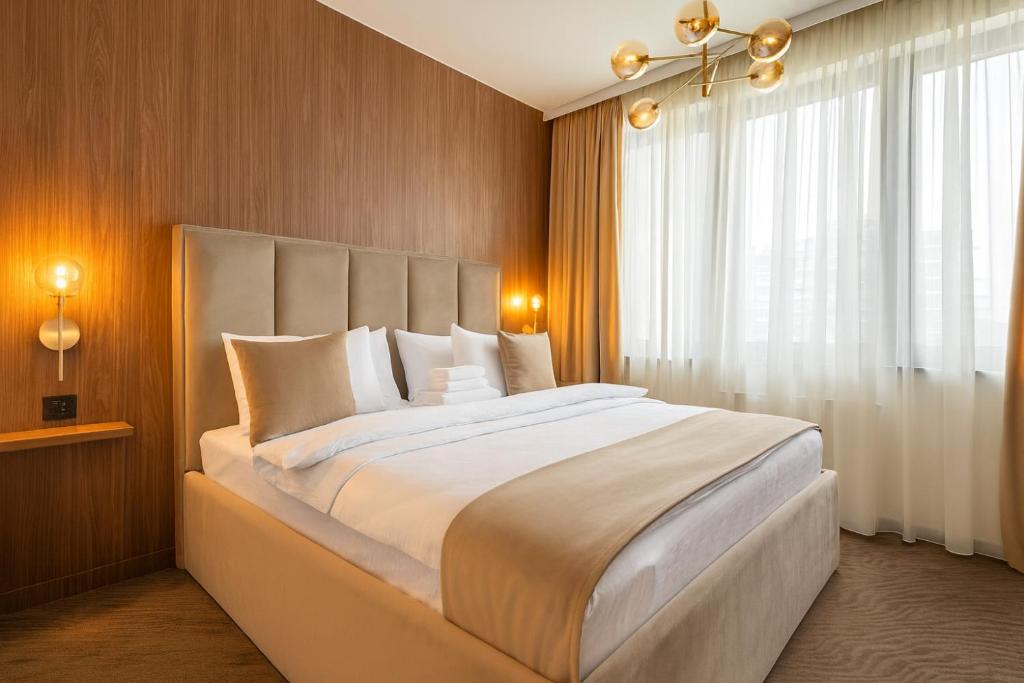 Ένα ή περισσότερα κρεβάτια σε δωμάτιο στο Belgrade Waterfront Luxury Studio