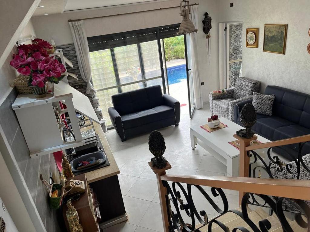 Χώρος καθιστικού στο Villa 2 houses, pool, nature view
