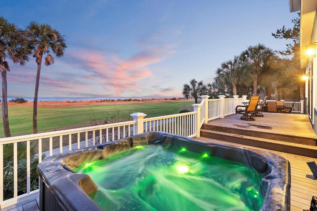 a hot tub on the deck of a house at OP58: 58 Ocean Point in Isle of Palms