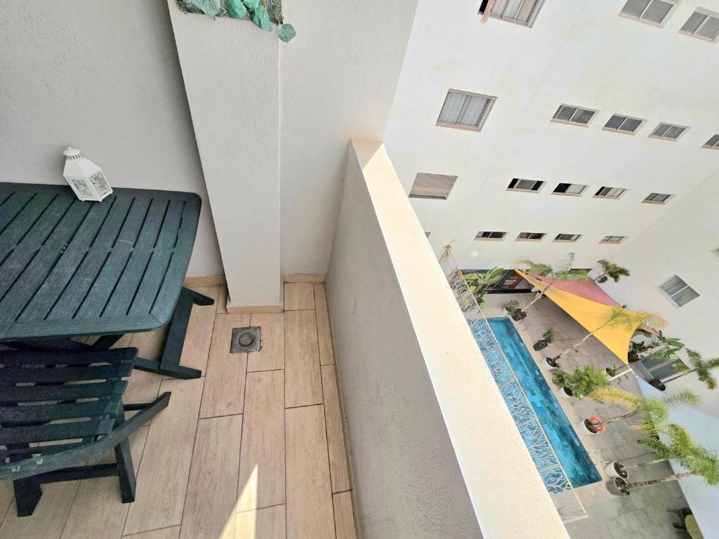 Bazén v ubytování Joli appartement Mohammédia nebo v jeho okolí