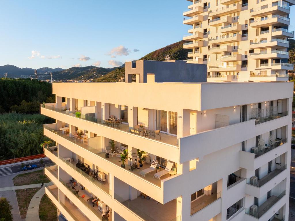 an exterior view of a building with balconies at Lantern Penthouse in Salerno