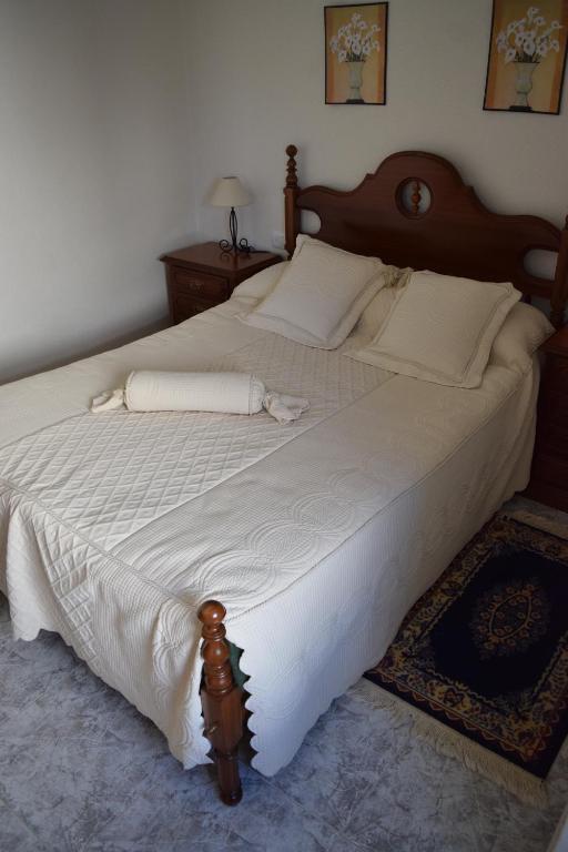 Postel nebo postele na pokoji v ubytování Chuca House