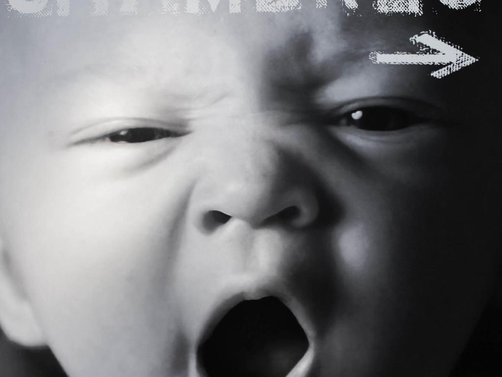 a young boy with his mouth open with his tongue at ibis budget Metz Sud in Augny