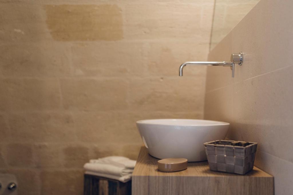 Un baño de Le Origini