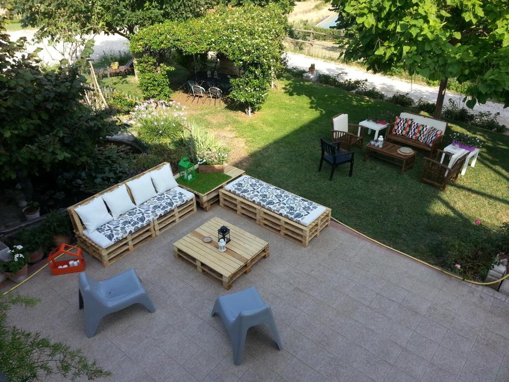 an aerial view of a patio with couches and tables at B&B La Casa Bianca in Fossacesia