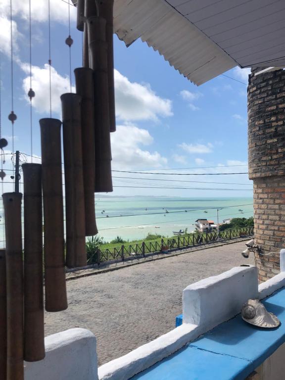 a view of the beach from a building at Suites Mahalo - 2 in Baía Formosa