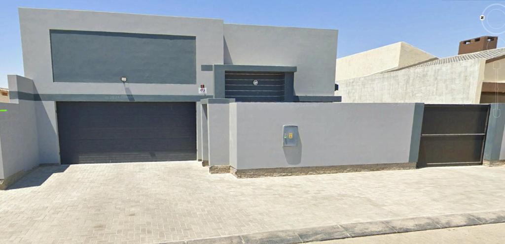 a building with a large screen on the side of it at Swakop Coastal Haven in Swakopmund
