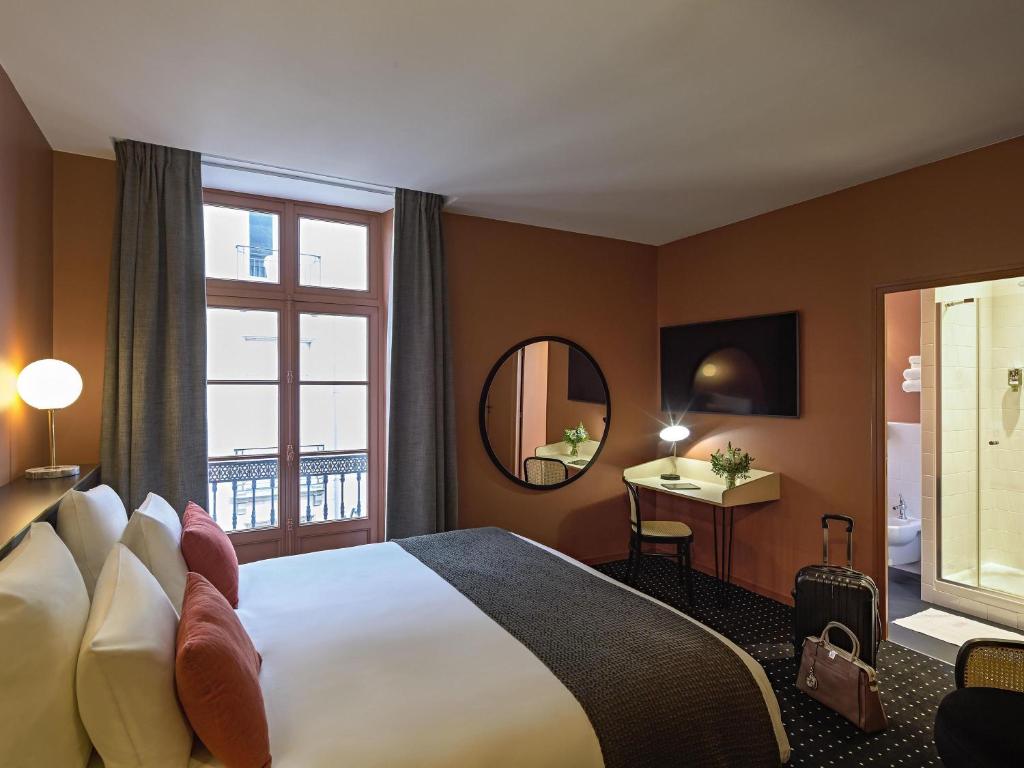 Katil atau katil-katil dalam bilik di Mercure Nantes Centre Passage Pommeraye