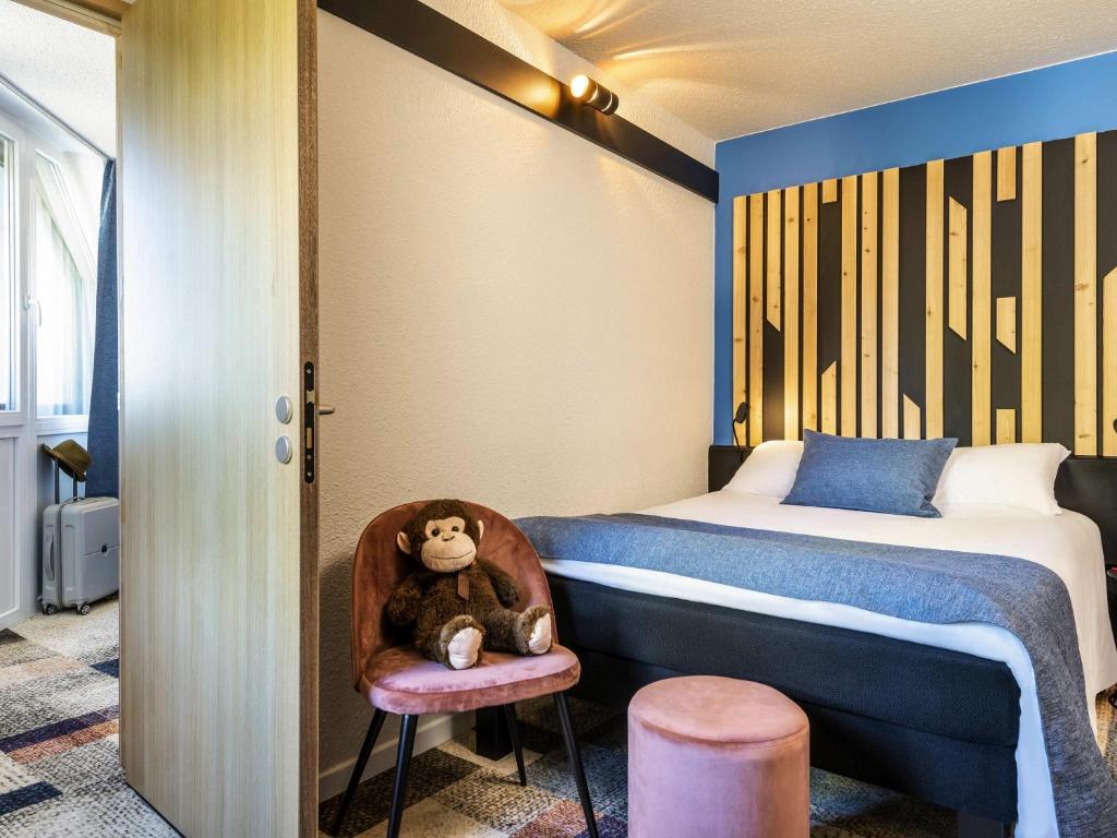 Кровать или кровати в номере ibis Styles Boulogne sur Mer Centre Cathédrale