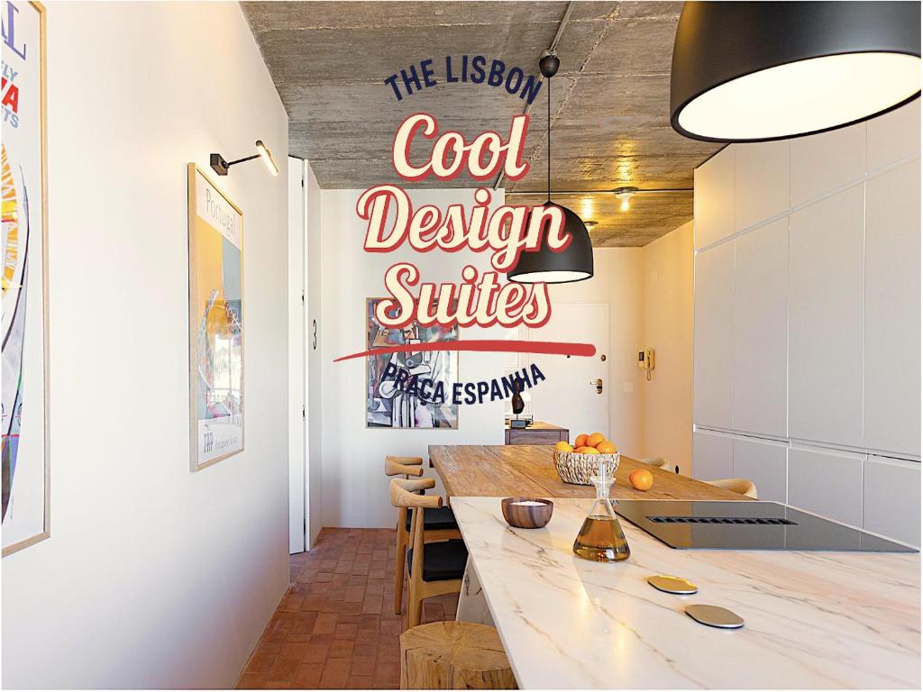 a kitchen with a sign that reads cool design suites at The Lisbon Cool Design Suites - Self Check In & Parking in Lisbon