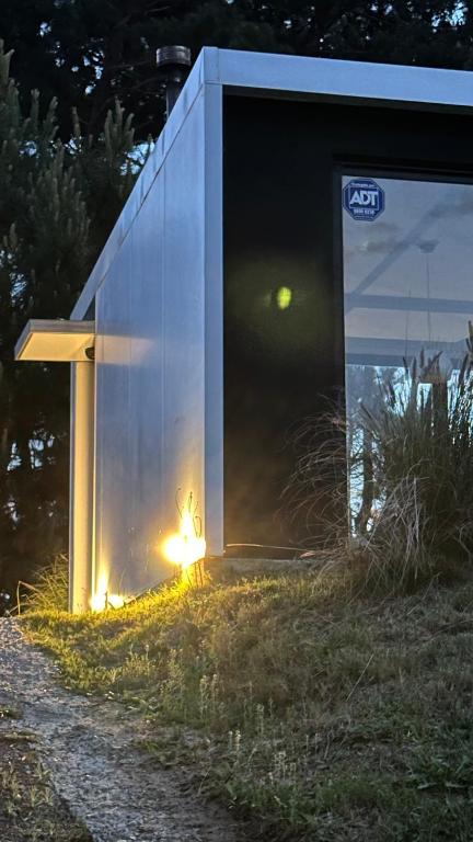 a small building with a fire inside of it at Loftdelbosque in Punta del Este