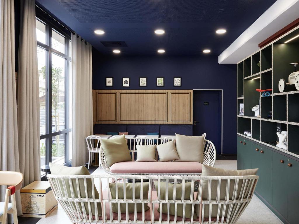 Χώρος καθιστικού στο Aparthotel Adagio Paris Suresnes Longchamp