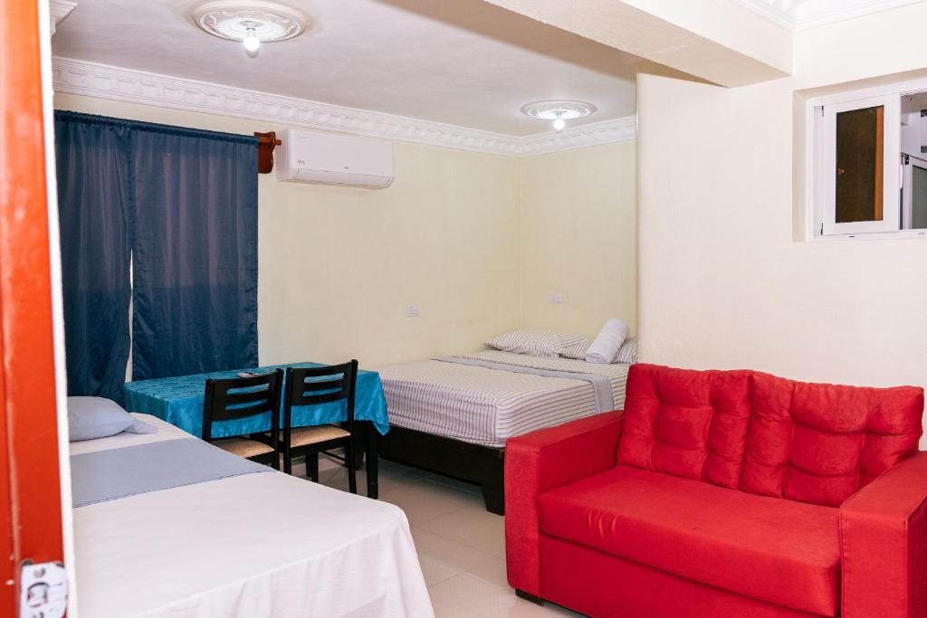 Postel nebo postele na pokoji v ubytování Double Room in Corales del Sur Parque del Este