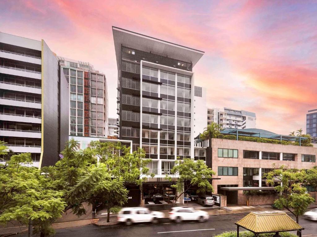 a rendering of a city with cars in front of buildings at Mantra Terrace Brisbane in Brisbane