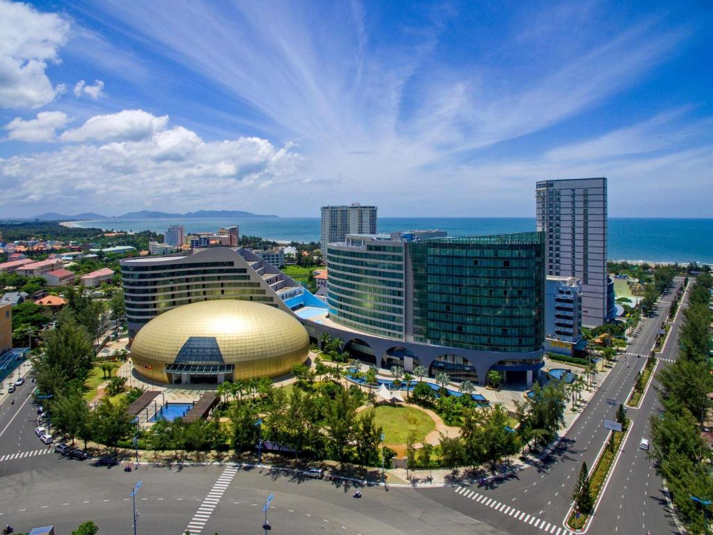 an aerial view of a city with tall buildings at Pullman Vung Tau in Vung Tau