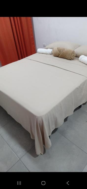 En eller flere senge i et værelse på Villa Coral Gables