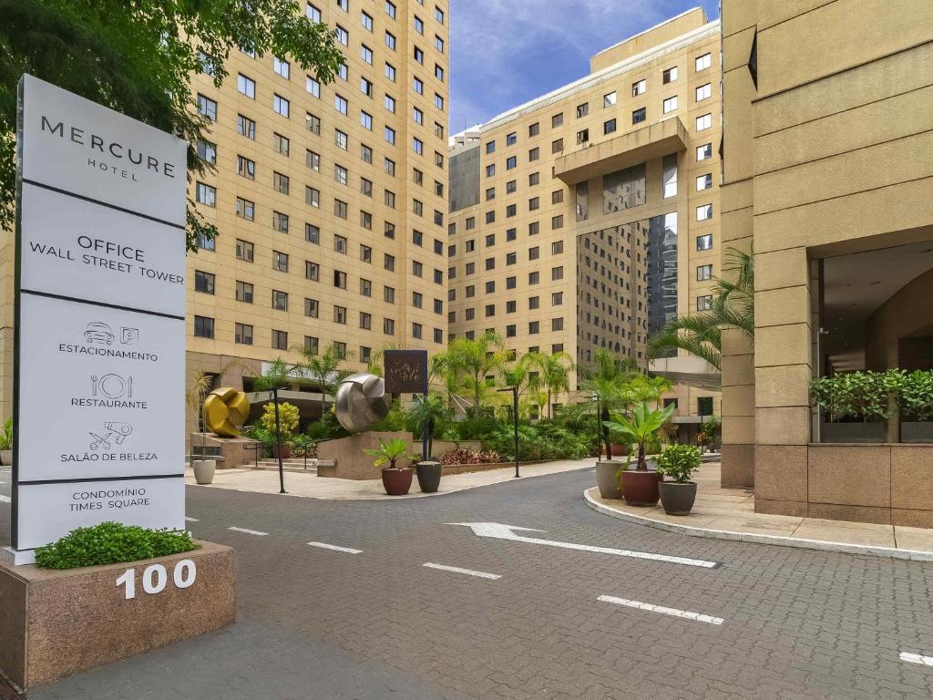 a rendering of a street in a city with buildings at Mercure Sao Paulo Moema Times Square in Sao Paulo