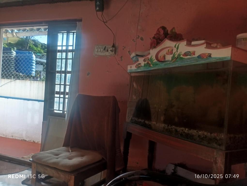 Χώρος καθιστικού στο Kumaresan Ooty home stay