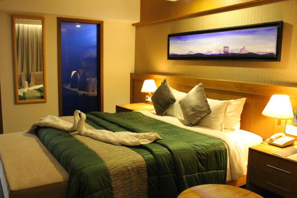 Postel nebo postele na pokoji v ubytování Vgp Golden Beach Resort