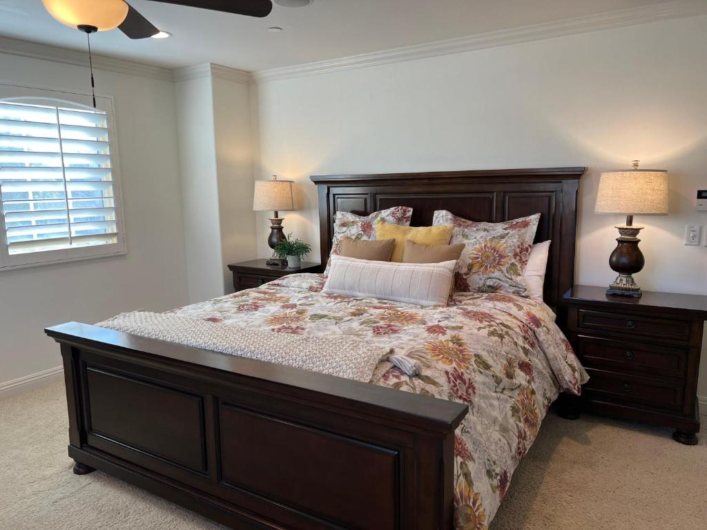 a bedroom with a large bed and two night stands at Destination #16 in Anaheim