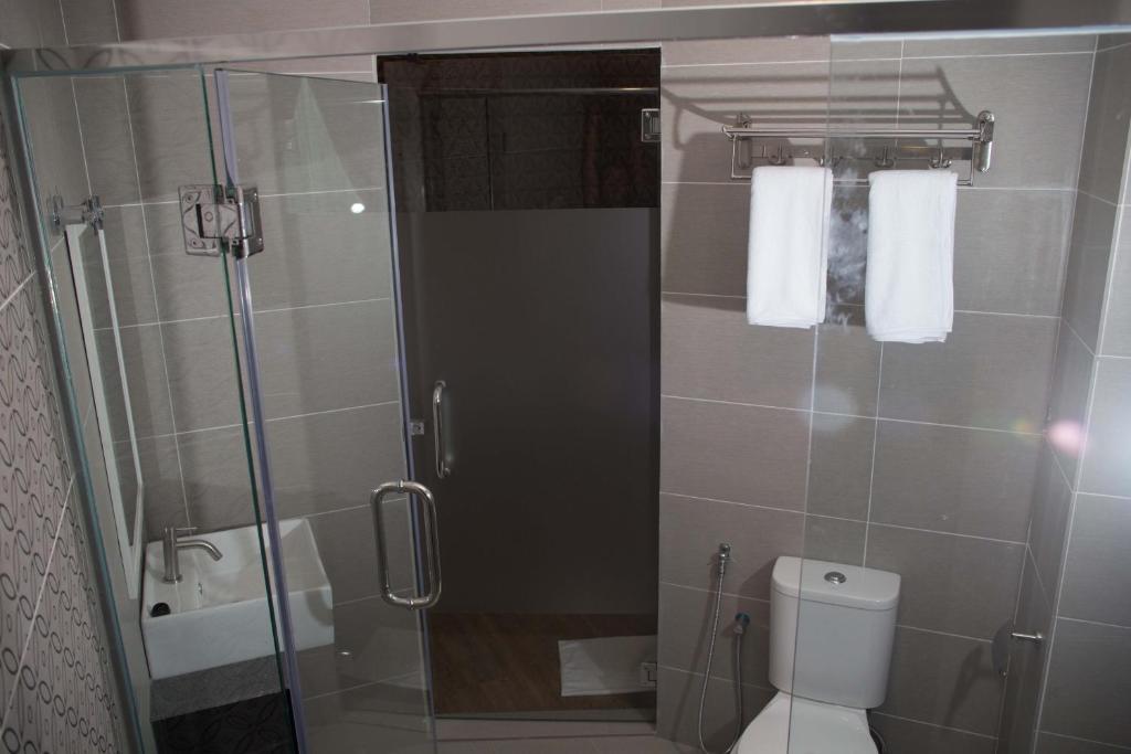 Koupelna v ubytování Qlassic Hotel