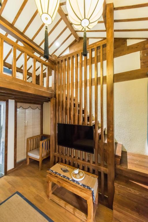 Posezení v ubytování Lijiang Yue Tu Inn