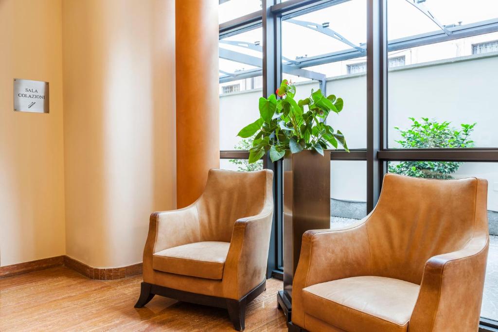 Posezení v ubytování Hotel Des Etrangers