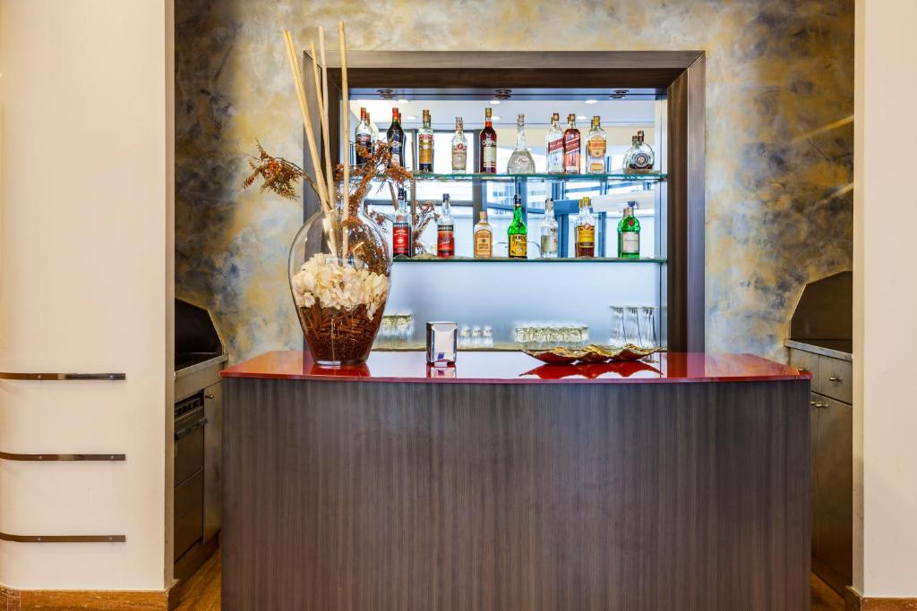 Nápoje v ubytování Hotel Des Etrangers