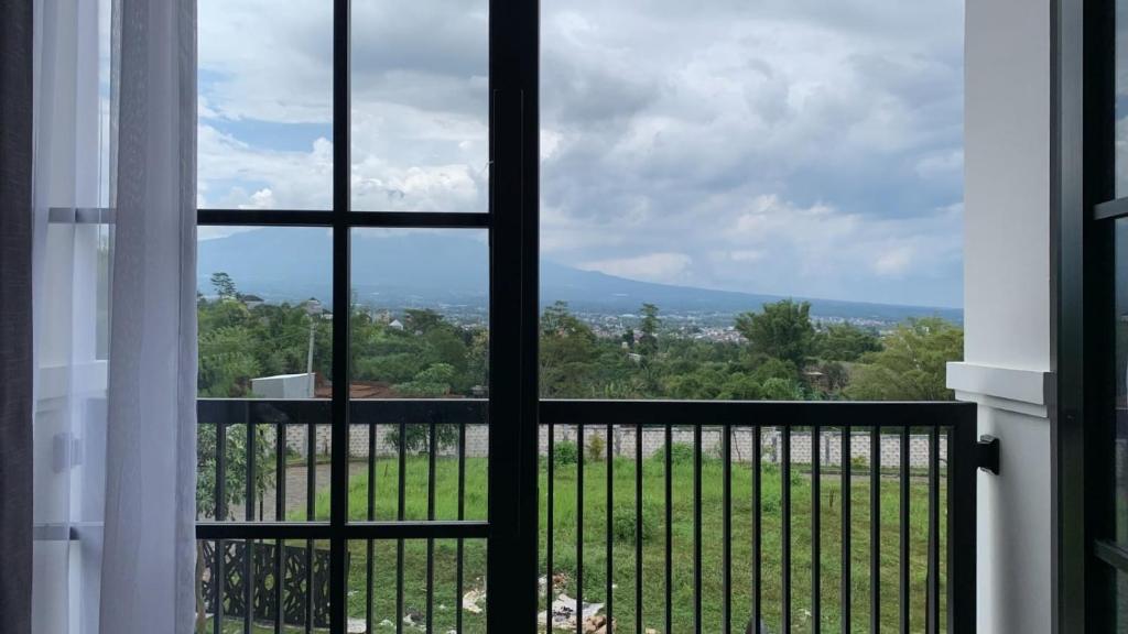 Fotografie z fotogalerie ubytování Inapstay - Villa Aura Puncak Landungsari v destinaci Dau