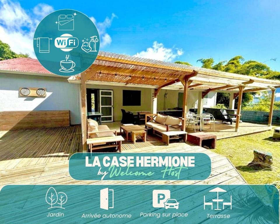 a house with a wooden deck with a pergola at Case Hermione – Vue Montagne à Hell-Bourg in Salazie