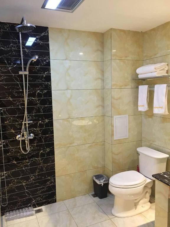 Koupelna v ubytování Bai Nian Sheng Shi Hotel