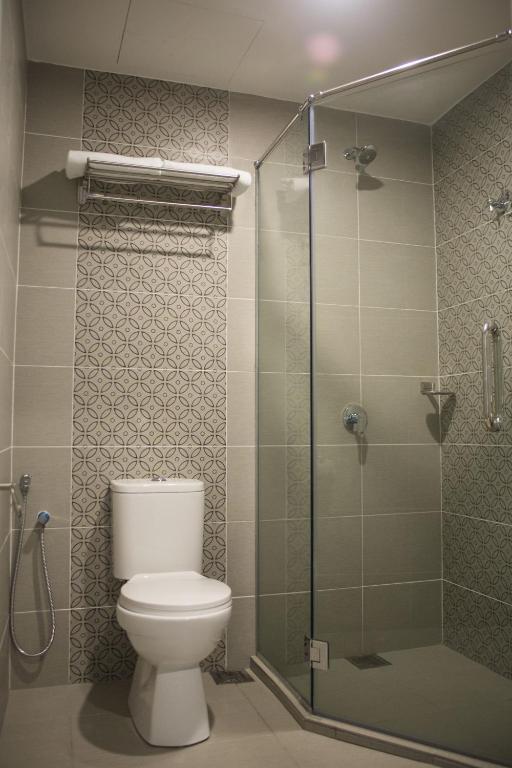 Koupelna v ubytování Qlassic Hotel