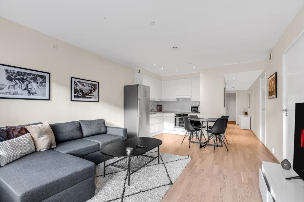 Khu vực ghế ngồi tại City apartment by Tromsøsundet