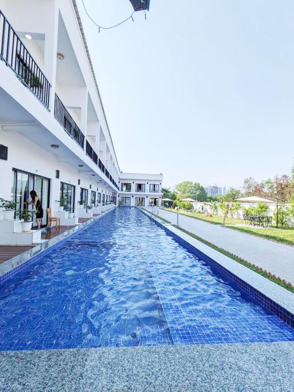 a swimming pool in the middle of a building at O Mary River Resort in Sihanoukville