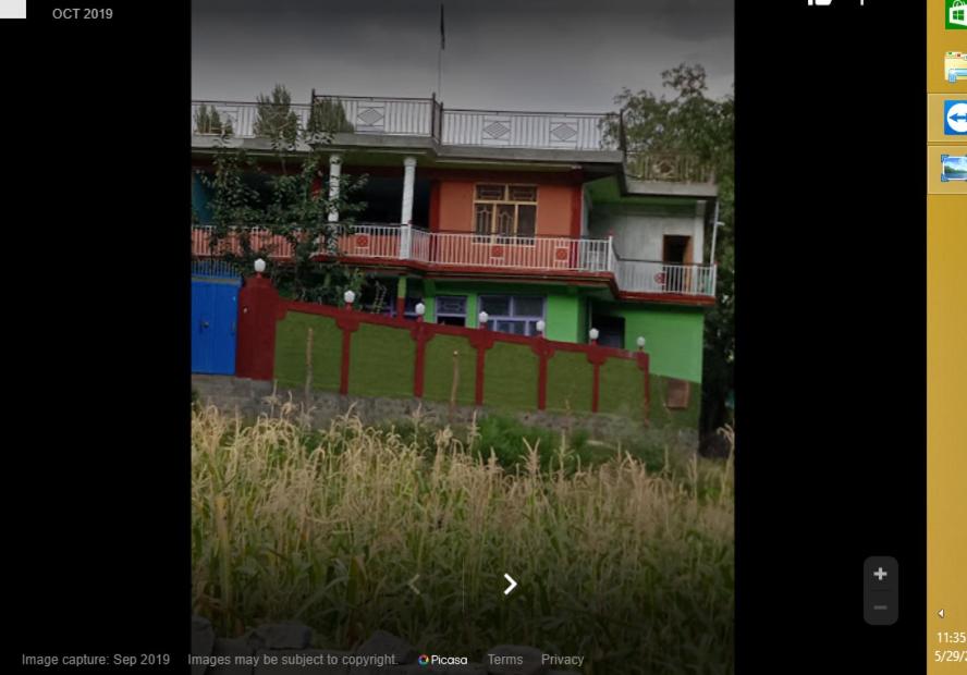 an image of a house with a fence at Malik Guest House in Dargai