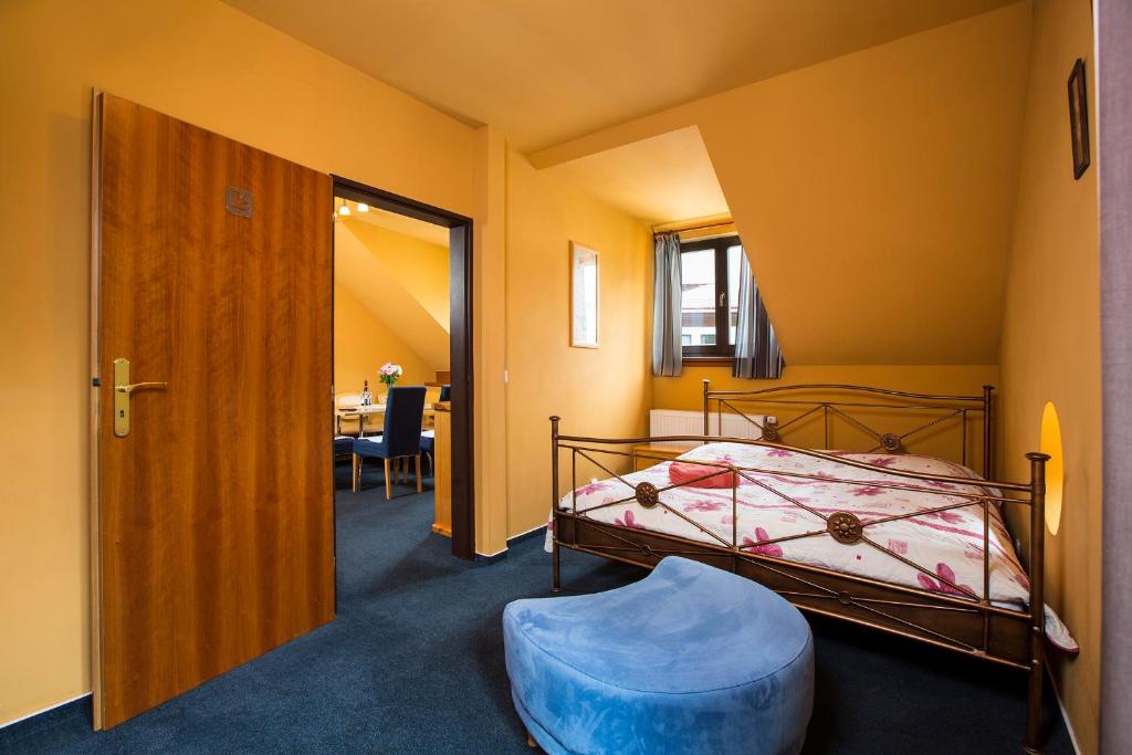Łóżko lub łóżka w pokoju w obiekcie Yellow Ski Apartments