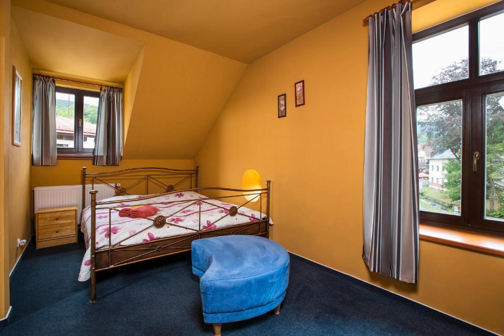 Łóżko lub łóżka w pokoju w obiekcie Yellow Ski Apartments